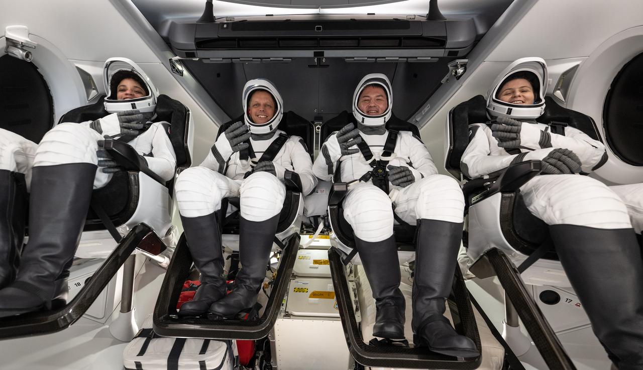 NASA astronauts Jessica Watkins, left, Robert Hines, Kjell Lindgren, and ESA (European Space Agency) astronaut Samantha Cristoforetti, right, are seen inside the SpaceX Crew Dragon Freedom spacecraft onboard the SpaceX recovery ship Megan shortly after having landed in the Atlantic Ocean off the coast of Jacksonville, Florida, Friday, Oct. 14, 2022. Lindgren, Hines, Watkins, and Cristoforetti are returning after 170 days in space as part of Expeditions 67 and 68 aboard the International Space Station. Photo Credit: (NASA/Bill Ingalls)