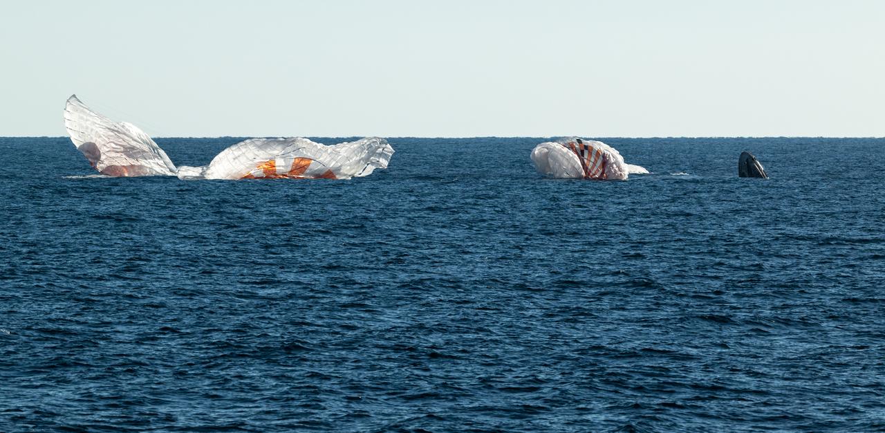 The SpaceX Crew Dragon Freedom spacecraft is seen as it lands with NASA astronauts Kjell Lindgren, Robert Hines, Jessica Watkins, and ESA (European Space Agency) astronaut Samantha Cristoforetti aboard in the Atlantic Ocean off the coast of Jacksonville, Florida, Friday, Oct. 14, 2022. Lindgren, Hines, Watkins, and Cristoforetti are returning after 170 days in space as part of Expeditions 67 and 68 aboard the International Space Station. Photo Credit: (NASA/Bill Ingalls)