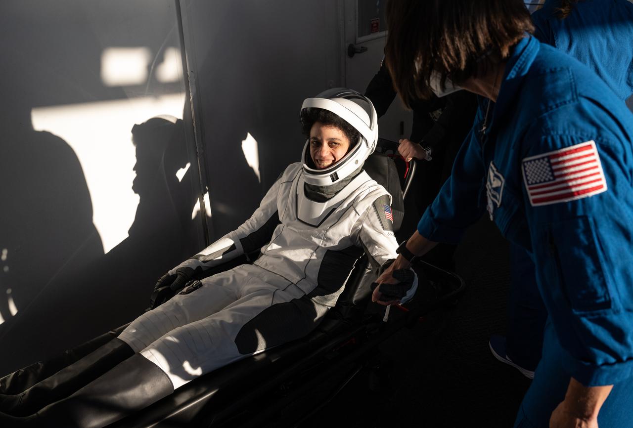 NASA astronaut Jessica Watkins is greeted by NASA astronaut representative Megan Behnken after having splashed down in the Atlantic Ocean off the coast of Jacksonville, Florida aboard the SpaceX Crew Dragon Freedom spacecraft with NASA astronauts Kjell Lindgren and Robert Hines, along with ESA (European Space Agency) astronaut Samantha Cristoforetti, Friday, Oct. 14, 2022. Lindgren, Hines, Watkins, and Cristoforetti are returned after 170 days in space as part of Expeditions 67 and 68 aboard the International Space Station. Photo Credit: (NASA/Bill Ingalls)