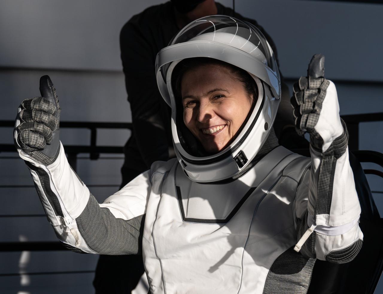 ESA (European Space Agency) astronaut Samantha Cristoforetti gives a thumbs up after being helped out of the SpaceX Crew Dragon Freedom spacecraft onboard the SpaceX recovery Megan ship after she and NASA astronauts Kjell Lindgren, Jessica Watkins, and Robert Hines, landed in the Atlantic Ocean off the coast of Jacksonville, Florida, Friday, Oct. 14, 2022. Lindgren, Hines, Watkins, and Cristoforetti are returning after 170 days in space as part of Expeditions 67 and 68 aboard the International Space Station. Photo Credit: (NASA/Bill Ingalls)