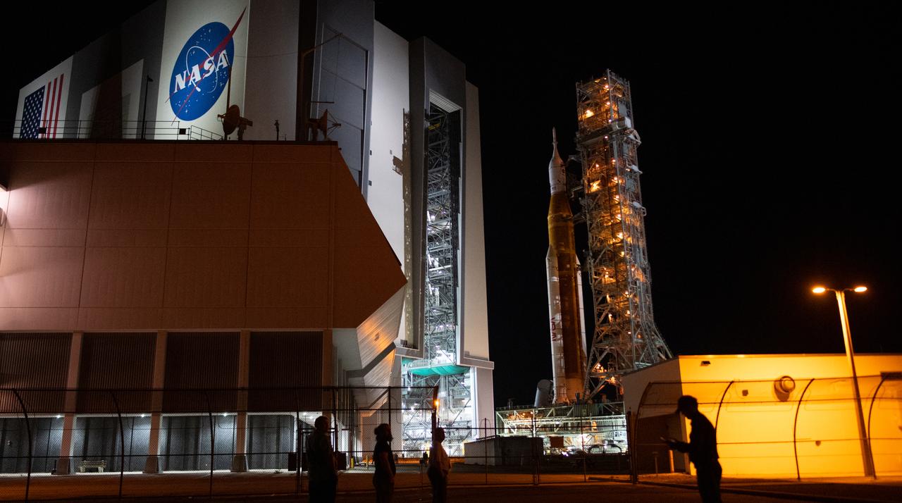 NASA’s Space Launch System (SLS) rocket with the Orion spacecraft aboard is seen atop a mobile launcher as it rolls out of the Vehicle Assembly Building to Launch Pad 39B, Friday, Nov. 4, 2022, at NASA’s Kennedy Space Center in Florida. NASA’s Artemis I mission is the first integrated test of the agency’s deep space exploration systems: the Orion spacecraft, SLS rocket, and supporting ground systems. Launch of the uncrewed flight test is targeted for Nov. 14 at 12:07 a.m. EST. Photo Credit: (NASA/Joel Kowsky)