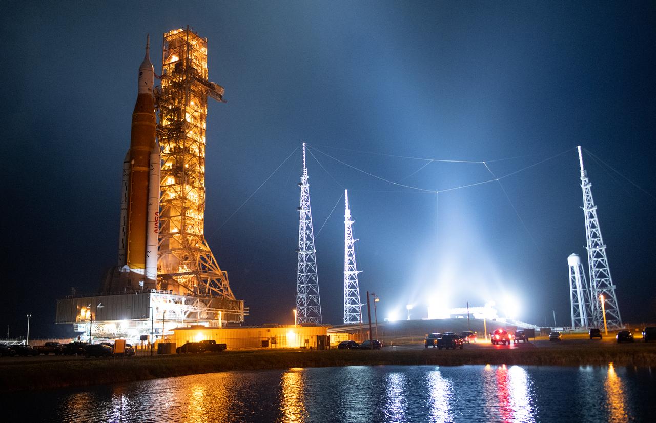 NASA’s Space Launch System (SLS) rocket with the Orion spacecraft aboard is seen atop the mobile launcher as Crawler Transporter-2 (CT-2) begins to climb the ramp at Launch Pad 39B, Friday, Nov. 4, 2022, at NASA’s Kennedy Space Center in Florida. NASA’s Artemis I mission is the first integrated test of the agency’s deep space exploration systems: the Orion spacecraft, SLS rocket, and supporting ground systems. Launch of the uncrewed flight test is targeted for Nov. 14 at 12:07 a.m. EST. Photo Credit: (NASA/Joel Kowsky)