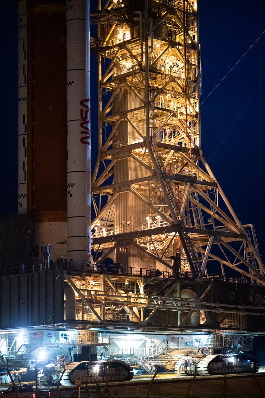 NASA’s Space Launch System (SLS) rocket with the Orion spacecraft aboard is seen atop the mobile launcher as Crawler Transporter-2 (CT-2) begins to climb the ramp at Launch Pad 39B, Friday, Nov. 4, 2022, at NASA’s Kennedy Space Center in Florida. NASA’s Artemis I mission is the first integrated test of the agency’s deep space exploration systems: the Orion spacecraft, SLS rocket, and supporting ground systems. Launch of the uncrewed flight test is targeted for Nov. 14 at 12:07 a.m. EST. Photo Credit: (NASA/Joel Kowsky)