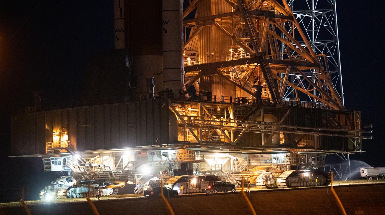 NASA’s Space Launch System (SLS) rocket with the Orion spacecraft aboard is seen atop the mobile launcher as Crawler Transporter-2 (CT-2) begins to climb the ramp at Launch Pad 39B, Friday, Nov. 4, 2022, at NASA’s Kennedy Space Center in Florida. NASA’s Artemis I mission is the first integrated test of the agency’s deep space exploration systems: the Orion spacecraft, SLS rocket, and supporting ground systems. Launch of the uncrewed flight test is targeted for Nov. 14 at 12:07 a.m. EST. Photo Credit: (NASA/Joel Kowsky)