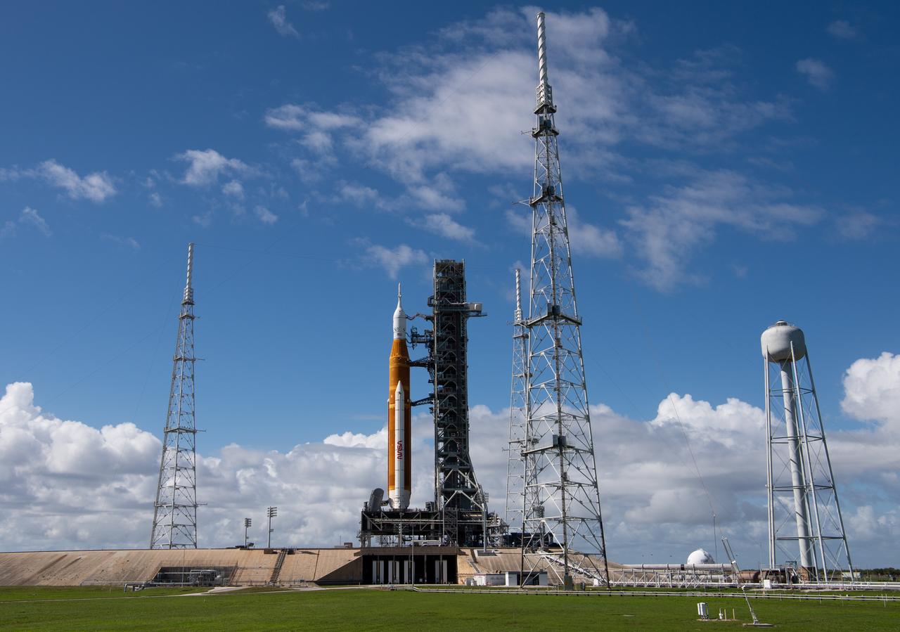 NASA’s Space Launch System (SLS) rocket with the Orion spacecraft aboard is seen atop a mobile launcher at Launch Complex 39B, Friday, Nov. 4, 2022, after being rolled out to the launch pad at NASA’s Kennedy Space Center in Florida. NASA’s Artemis I mission is the first integrated test of the agency’s deep space exploration systems: the Orion spacecraft, SLS rocket, and supporting ground systems. Launch of the uncrewed flight test is targeted for Nov. 14 at 12:07 a.m. EST. Photo Credit: (NASA/Joel Kowsky)
