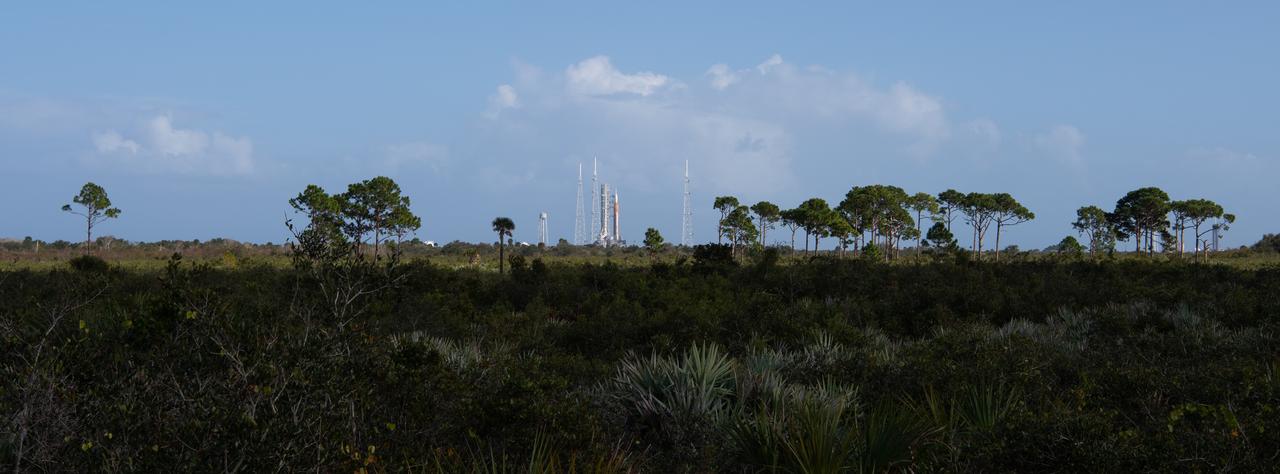 NASA’s Space Launch System (SLS) rocket with the Orion spacecraft aboard is seen atop a mobile launcher at Launch Pad 39B as preparations for launch continue, Saturday, Nov. 5, 2022, at NASA’s Kennedy Space Center in Florida. NASA’s Artemis I flight test is the first integrated test of the agency’s deep space exploration systems: the Orion spacecraft, SLS rocket, and supporting ground systems. Launch of the uncrewed flight test is targeted for Nov. 14 at 12:07 a.m. EST. Photo Credit: (NASA/Joel Kowsky)