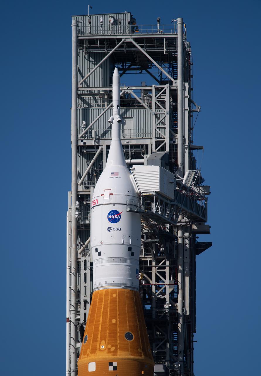NASA’s Space Launch System (SLS) rocket with the Orion spacecraft aboard is seen atop a mobile launcher at Launch Pad 39B as preparations for launch continue, Saturday, Nov. 5, 2022, at NASA’s Kennedy Space Center in Florida. NASA’s Artemis I flight test is the first integrated test of the agency’s deep space exploration systems: the Orion spacecraft, SLS rocket, and supporting ground systems. Launch of the uncrewed flight test is targeted for Nov. 14 at 12:07 a.m. EST. Photo Credit: (NASA/Joel Kowsky)