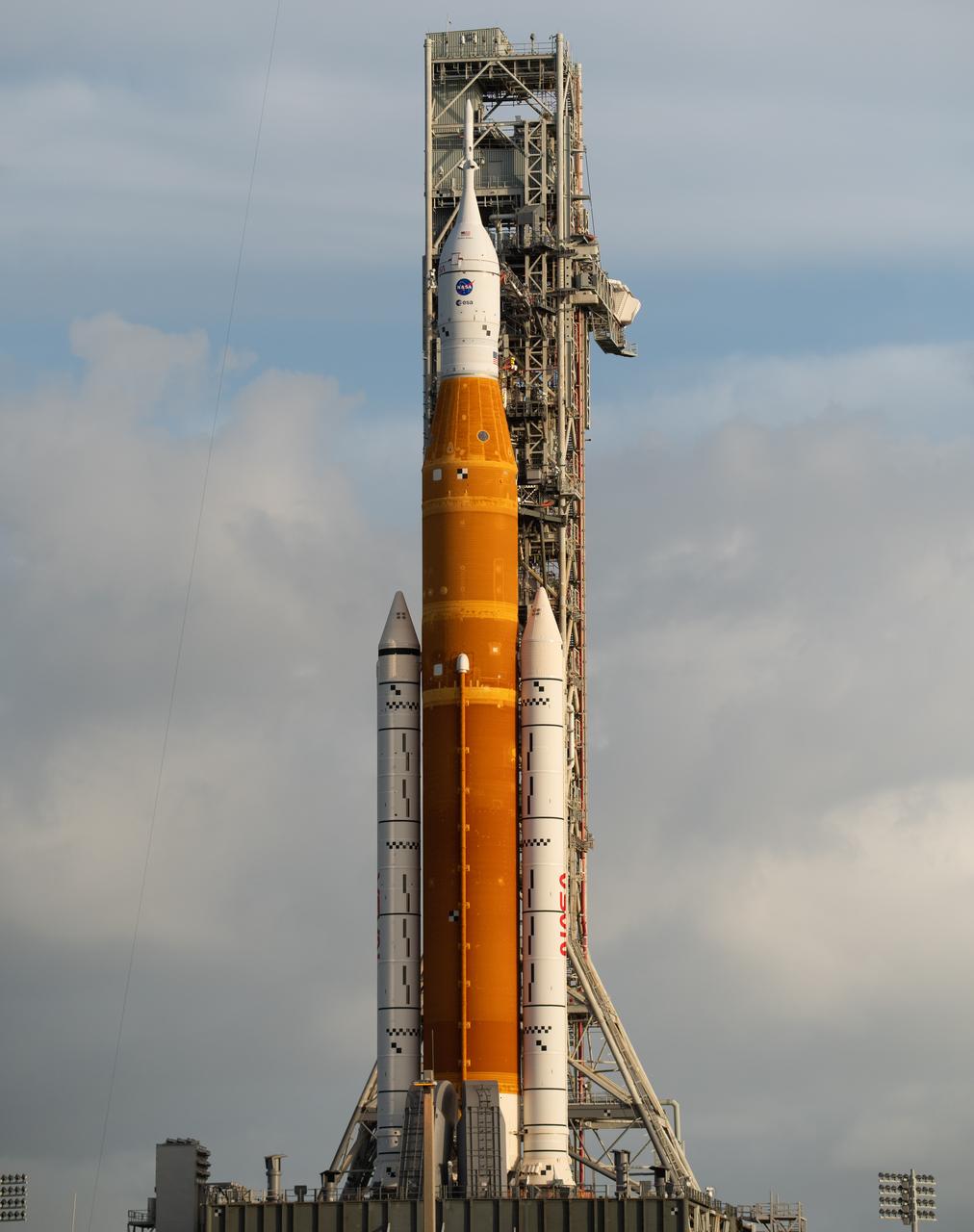 NASA’s Space Launch System (SLS) rocket with the Orion spacecraft aboard is seen atop the mobile launcher at Launch Pad 39B, Tuesday, Nov. 8, 2022, at NASA’s Kennedy Space Center in Florida. Teams at Kennedy continue to monitor the weather forecast for Tropical Storm Nicole ahead of the next launch attempt. NASA’s Artemis I flight test is the first integrated test of the agency’s deep space exploration systems: the Orion spacecraft, SLS rocket, and supporting ground systems. Photo Credit: (NASA/Joel Kowsky)