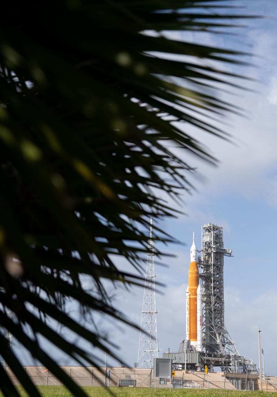 NASA’s Space Launch System (SLS) rocket with the Orion spacecraft aboard is seen atop the mobile launcher at Launch Pad 39B, Tuesday, Nov. 8, 2022, at NASA’s Kennedy Space Center in Florida. Teams at Kennedy continue to monitor the weather forecast for Tropical Storm Nicole ahead of the next launch attempt. NASA’s Artemis I flight test is the first integrated test of the agency’s deep space exploration systems: the Orion spacecraft, SLS rocket, and supporting ground systems. Photo Credit: (NASA/Joel Kowsky)