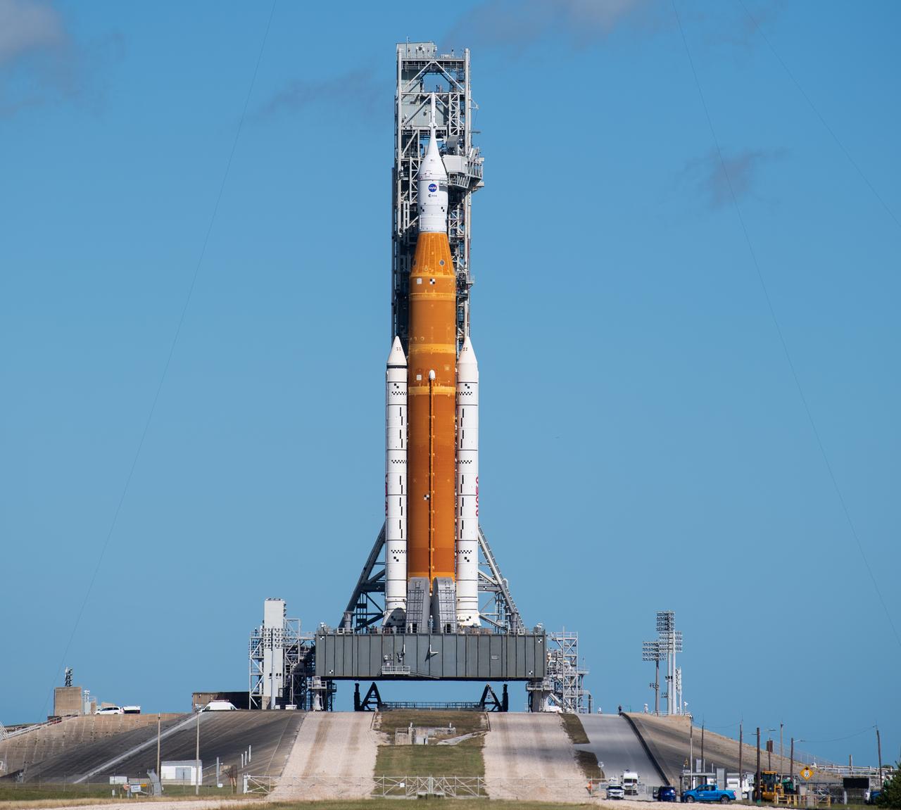 NASA’s Space Launch System (SLS) rocket with the Orion spacecraft aboard is seen atop the mobile launcher at Launch Pad 39B, Friday, Nov. 11, 2022, at NASA’s Kennedy Space Center in Florida. Teams began walkdowns and inspections at the pad to assess the status of the rocket and spacecraft after the passage of Hurricane Nicole. NASA’s Artemis I flight test is the first integrated test of the agency’s deep space exploration systems: the Orion spacecraft, SLS rocket, and supporting ground systems. Launch of the uncrewed flight test is targeted for no earlier than Nov. 16 at 1:04 a.m. EST. Photo Credit: (NASA/Joel Kowsky)