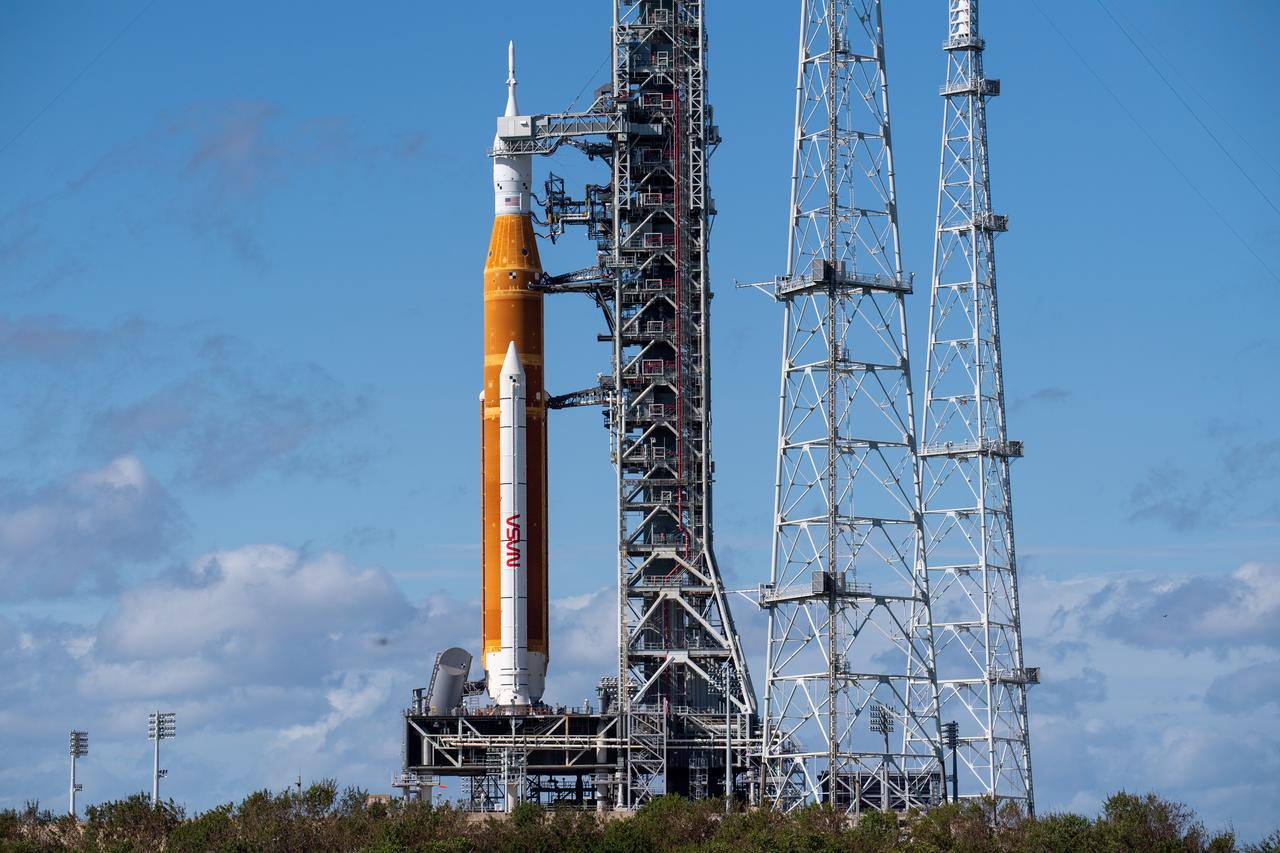 NASA’s Space Launch System (SLS) rocket with the Orion spacecraft aboard is seen atop the mobile launcher at Launch Pad 39B, Friday, Nov. 11, 2022, at NASA’s Kennedy Space Center in Florida. Teams began walkdowns and inspections at the pad to assess the status of the rocket and spacecraft after the passage of Hurricane Nicole. NASA’s Artemis I flight test is the first integrated test of the agency’s deep space exploration systems: the Orion spacecraft, SLS rocket, and supporting ground systems. Launch of the uncrewed flight test is targeted for no earlier than Nov. 16 at 1:04 a.m. EST. Photo Credit: (NASA/Joel Kowsky)