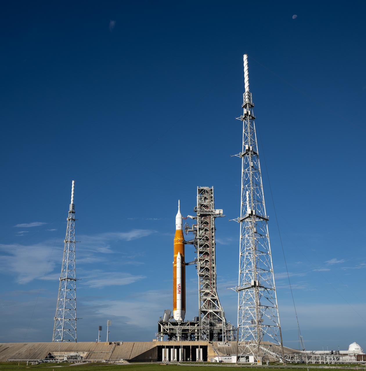 NASA’s Space Launch System (SLS) rocket with the Orion spacecraft aboard is seen atop a mobile launcher at Launch Pad 39B as preparations for launch continue, Sunday, Nov. 13, 2022, at NASA’s Kennedy Space Center in Florida. NASA’s Artemis I flight test is the first integrated test of the agency’s deep space exploration systems: the Orion spacecraft, SLS rocket, and supporting ground systems. Launch of the uncrewed flight test is targeted for no earlier than Nov. 16 at 1:04 a.m. EST. Photo Credit: (NASA/Bill Ingalls)