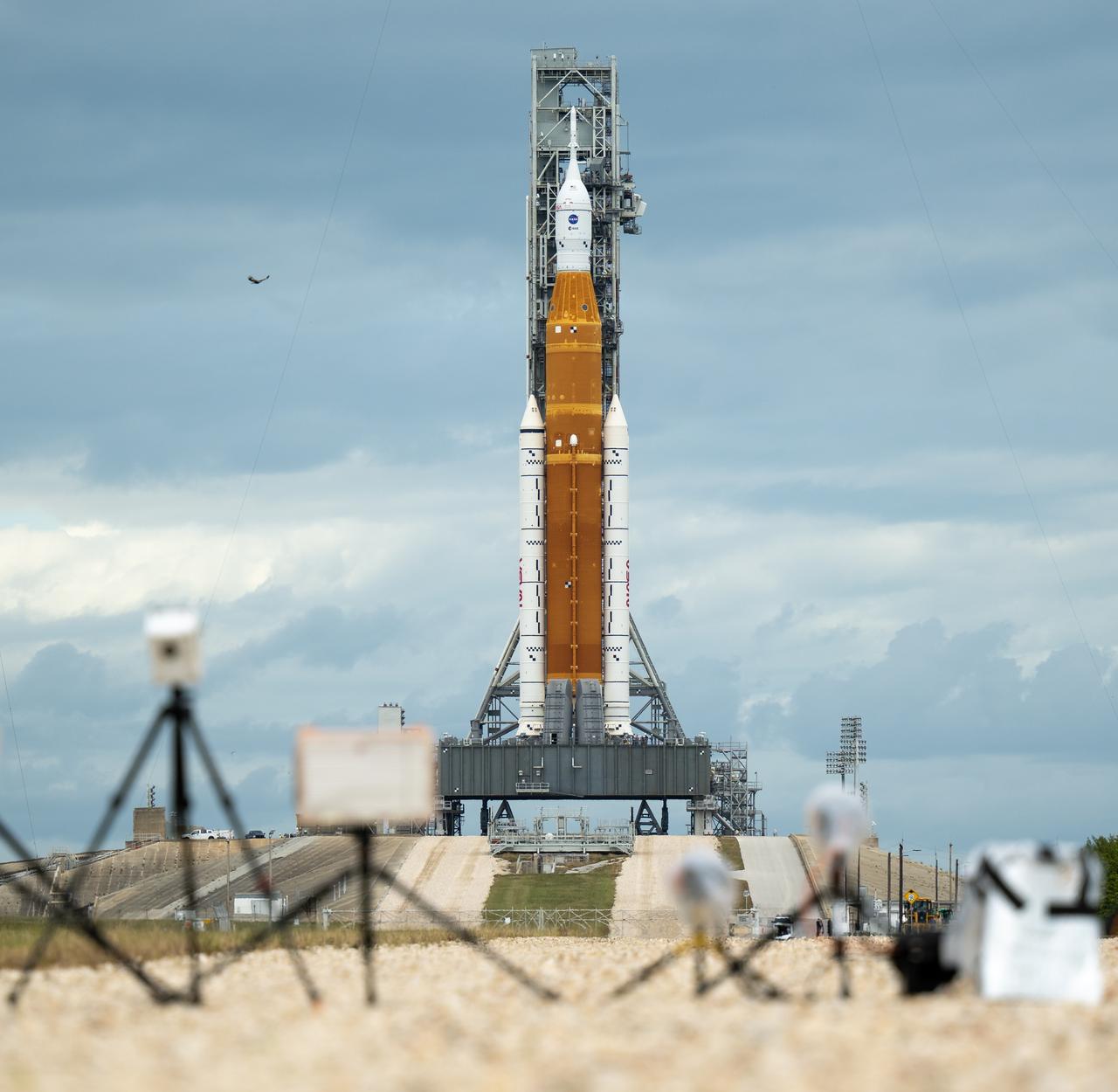 Media remote cameras are setup outside Launch Pad 39B and aimed at NASA’s Space Launch System (SLS) rocket with the Orion spacecraft aboard as preparations for launch continue, Sunday, Nov. 13, 2022, at NASA’s Kennedy Space Center in Florida. NASA’s Artemis I flight test is the first integrated test of the agency’s deep space exploration systems: the Orion spacecraft, SLS rocket, and supporting ground systems. Launch of the uncrewed flight test is targeted for no earlier than Nov. 16 at 1:04 a.m. EST.  Photo Credit: (NASA/Bill Ingalls)