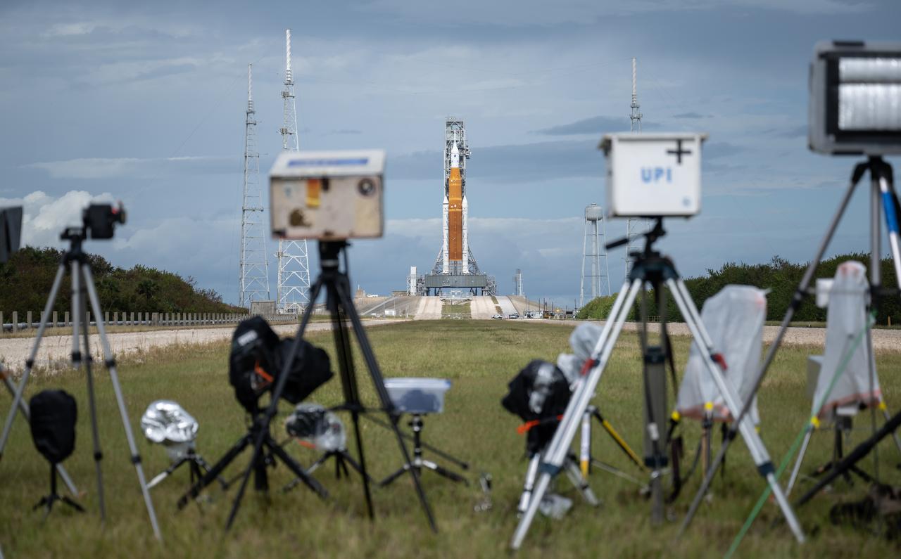 Media remote cameras are setup outside Launch Pad 39B and aimed at NASA’s Space Launch System (SLS) rocket with the Orion spacecraft aboard as preparations for launch continue, Sunday, Nov. 13, 2022, at NASA’s Kennedy Space Center in Florida. NASA’s Artemis I flight test is the first integrated test of the agency’s deep space exploration systems: the Orion spacecraft, SLS rocket, and supporting ground systems. Launch of the uncrewed flight test is targeted for no earlier than Nov. 16 at 1:04 a.m. EST. Photo Credit: (NASA/Bill Ingalls)