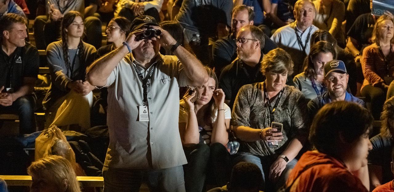 Guests at the Banana Creek viewing site are seen as they wait for the launch of NASA’s Space Launch System rocket carrying the Orion spacecraft on the Artemis I flight test, Tuesday, Nov. 15, 2022, at NASA’s Kennedy Space Center in Florida. NASA’s Artemis I flight test is the first integrated flight test of the agency’s deep space exploration systems: the Orion spacecraft, Space Launch System (SLS) rocket, and ground systems. Launch of the uncrewed flight test is targeted for no earlier than no earlier Nov. 16 at 1:47 a.m. EST. Photo Credit: (NASA/Keegan Barber)