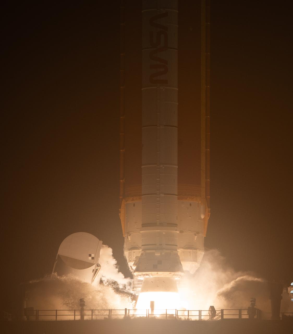 NASA’s Space Launch System rocket carrying the Orion spacecraft launches on the Artemis I flight test, Wednesday, Nov. 16, 2022, from Launch Complex 39B at NASA’s Kennedy Space Center in Florida. NASA’s Artemis I mission is the first integrated flight test of the agency’s deep space exploration systems: the Orion spacecraft, Space Launch System (SLS) rocket, and ground systems. SLS and Orion launched at 1:47 a.m. EST, from Launch Pad 39B at the Kennedy Space Center. Photo Credit: (NASA/Joel Kowsky)