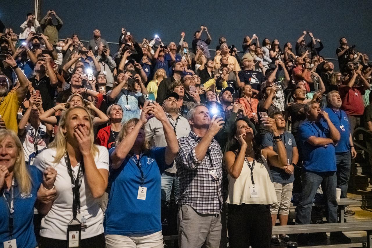 Guests at the Banana Creek viewing site watch the launch of NASA’s Space Launch System rocket carrying the Orion spacecraft on the Artemis I flight test, Wednesday, Nov. 16, 2022, at NASA’s Kennedy Space Center in Florida. NASA’s Artemis I flight test is the first integrated flight test of the agency’s deep space exploration systems: the Orion spacecraft, Space Launch System (SLS) rocket, and ground systems. SLS and Orion launched at 1:47 a.m. EST, from Launch Pad 39B at the Kennedy Space Center. Photo Credit: (NASA/Keegan Barber)
