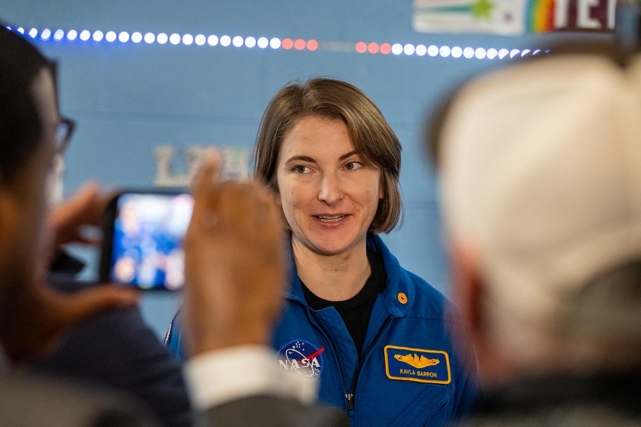 NASA astronaut Kayla Barron is seen as she and fellow crewmates Raja Chari, Tom Marshburn, and Mark Vande Hei visit Amidon-Bowen Elementary School, Thursday, Dec. 8, 2022, in Washington. Vande Hei spent 355 days in space as a member of Expedition 65/66 and was joined during Expedition 66 by Marshburn, Chari, and Barron who spent 177 days onboard the International Space Station. Photo Credit: (NASA/Keegan Barber)