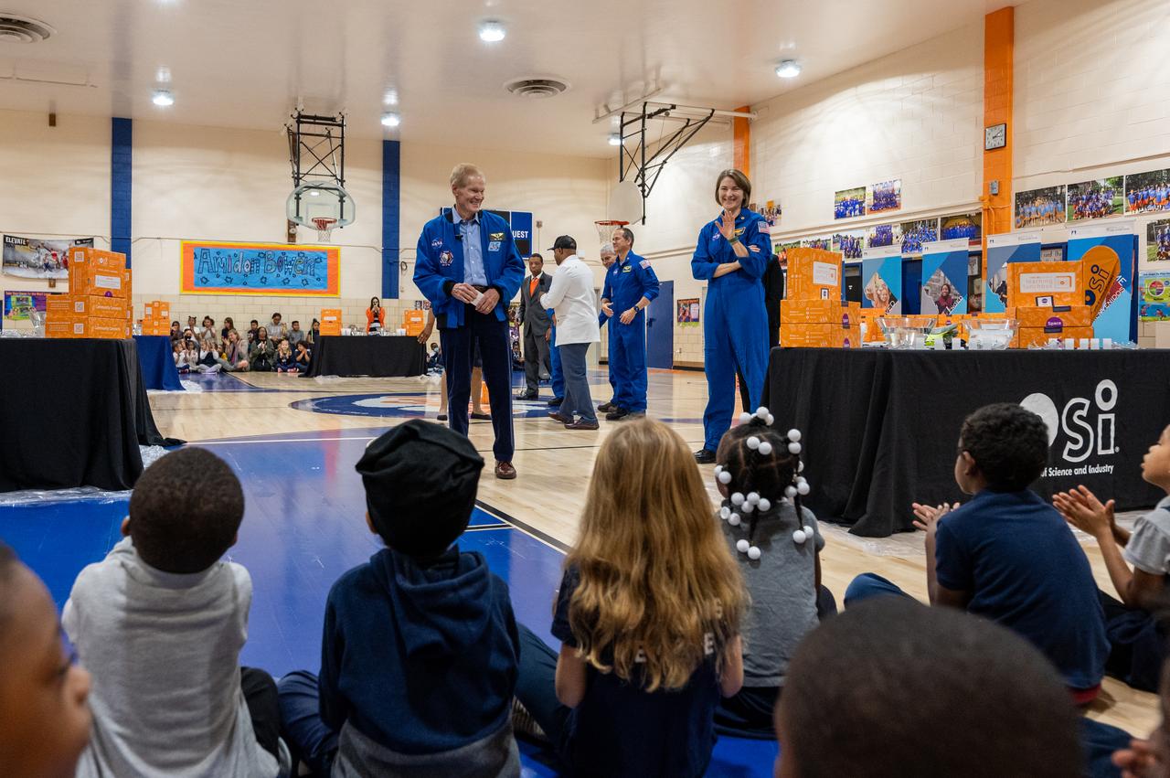NASA Administrator Bill Nelson and NASA astronauts Raja Chari, Kayla Barron, Tom Marshburn, and Mark Vande Hei speak with students during their visit to Amidon-Bowen Elementary School, Thursday, Dec. 8, 2022, in Washington. Vande Hei spent 355 days in space as a member of Expedition 65/66 and was joined during Expedition 66 by Marshburn, Chari, and Barron who spent 177 days onboard the International Space Station. Photo Credit: (NASA/Keegan Barber)