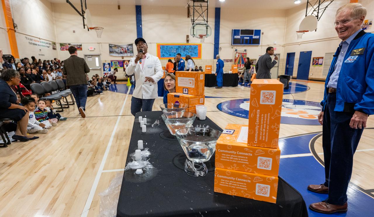 NASA Administrator Bill Nelson, right, participates in STEM demonstrations with students during a visit by NASA astronauts Kayla Barron, center, and crewmates Raja Chari, Tom Marshburn, and Mark Vande Hei, to Amidon-Bowen Elementary School, Thursday, Dec. 8, 2022, in Washington. Vande Hei spent 355 days in space as a member of Expedition 65/66 and was joined during Expedition 66 by Marshburn, Chari, and Barron who spent 177 days onboard the International Space Station. Photo Credit: (NASA/Keegan Barber)
