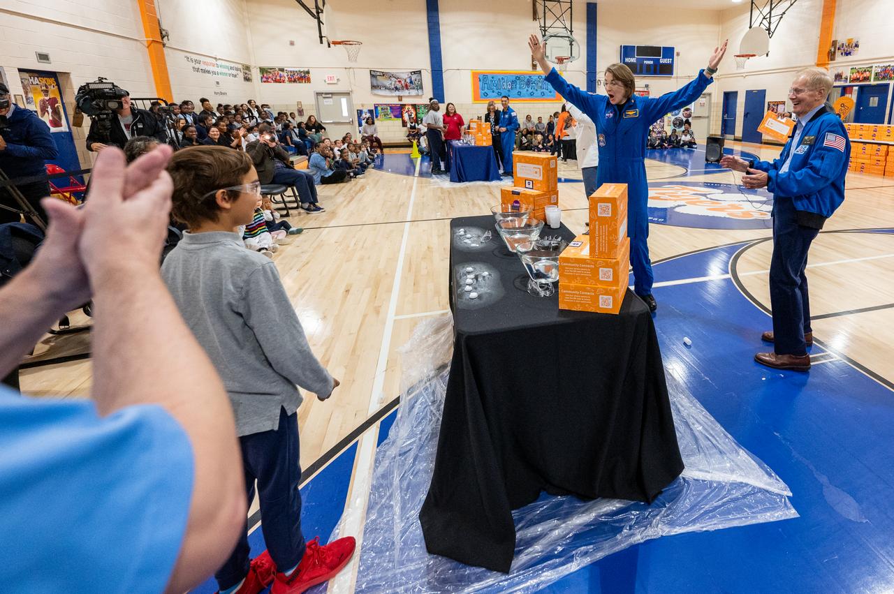 NASA Administrator Bill Nelson, right, and NASA astronaut Kayla Barron, left, participate in STEM demonstrations with students during a visit along with NASA astronauts Raja Chari, Tom Marshburn, and Mark Vande Hei, to Amidon-Bowen Elementary School, Thursday, Dec. 8, 2022, in Washington. Vande Hei spent 355 days in space as a member of Expedition 65/66 and was joined during Expedition 66 by Marshburn, Chari, and Barron who spent 177 days onboard the International Space Station. Photo Credit: (NASA/Keegan Barber)
