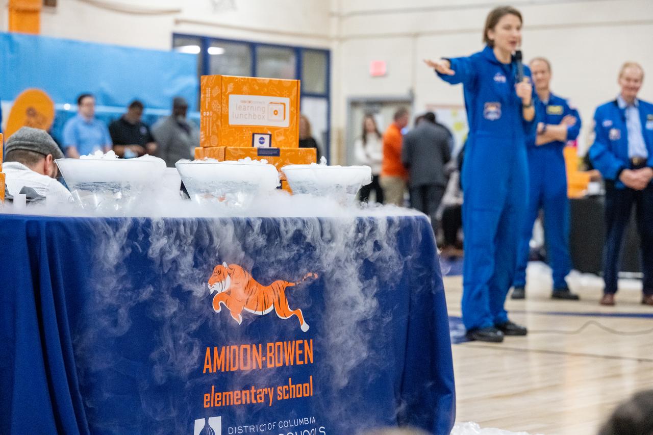 NASA astronaut Kayla Barron speaks during science demonstrations as she and fellow crewmates Raja Chari, Tom Marshburn, and Mark Vande Hei visit Amidon-Bowen Elementary School, Thursday, Dec. 8, 2022, in Washington. Vande Hei spent 355 days in space as a member of Expedition 65/66 and was joined during Expedition 66 by Marshburn, Chari, and Barron who spent 177 days onboard the International Space Station. Photo Credit: (NASA/Keegan Barber)