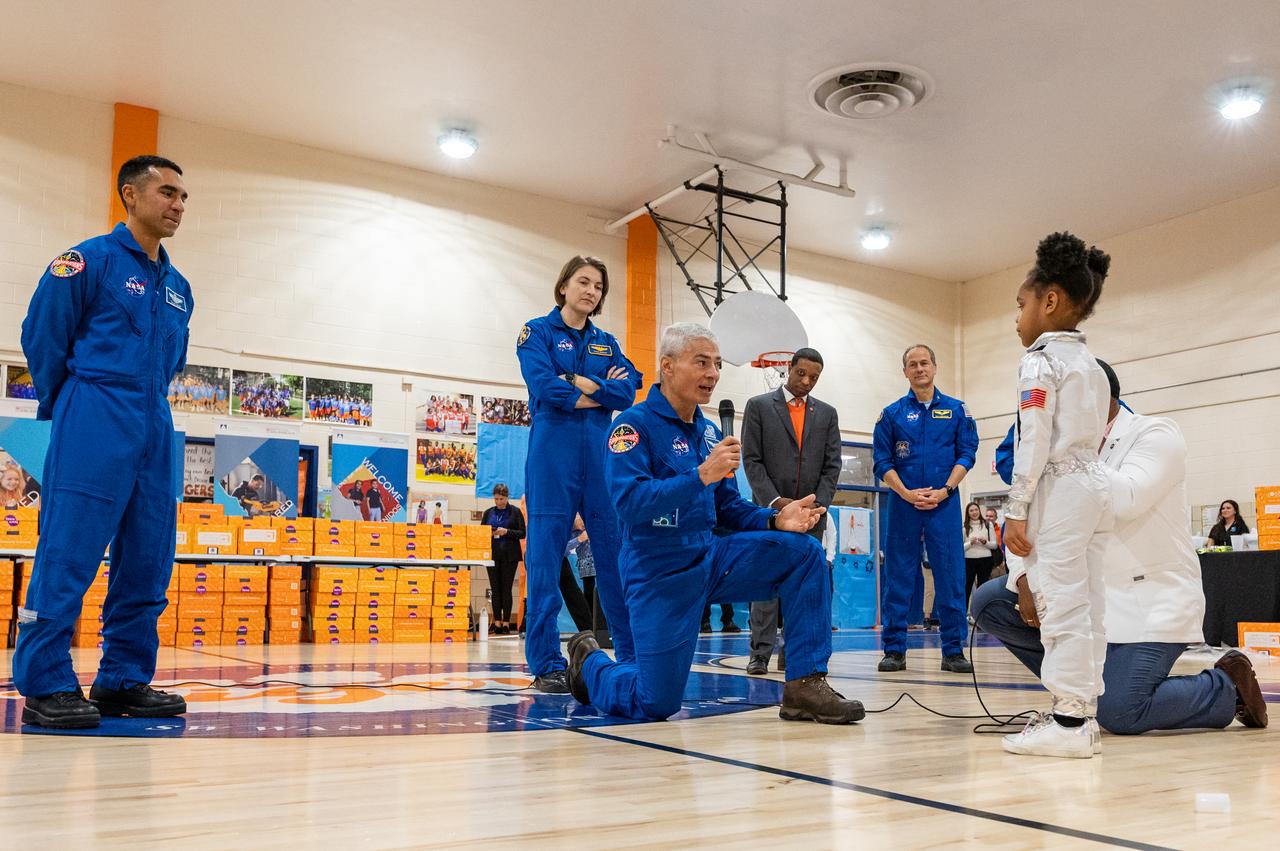 NASA astronaut Mark Vande Hei speaks with students during a visit to Amidon-Bowen Elementary School with Expedition 66 crewmates NASA astronauts Raja Chari, Kayla Barron, Tom Marshburn and NASA Administrator Bill Nelson, Thursday, Dec. 8, 2022, in Washington. Vande Hei spent 355 days in space as a member of Expedition 65/66 and was joined during Expedition 66 by Marshburn, Chari, and Barron who spent 177 days onboard the International Space Station. Photo Credit: (NASA/Keegan Barber)