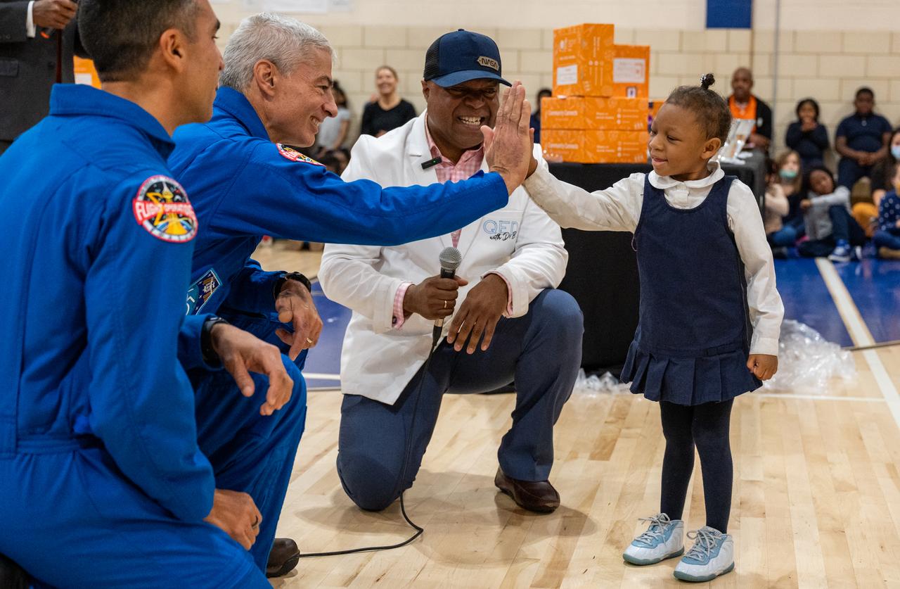 NASA astronaut Mark Vande Hei, second from left, speaks with students as he and fellow crewmates Kayla Barron, Tom Marshburn, and Raja Chari visit Amidon-Bowen Elementary School, Thursday, Dec. 8, 2022, in Washington. Vande Hei spent 355 days in space as a member of Expedition 65/66 and was joined during Expedition 66 by Marshburn, Chari, and Barron who spent 177 days onboard the International Space Station. Photo Credit: (NASA/Keegan Barber)