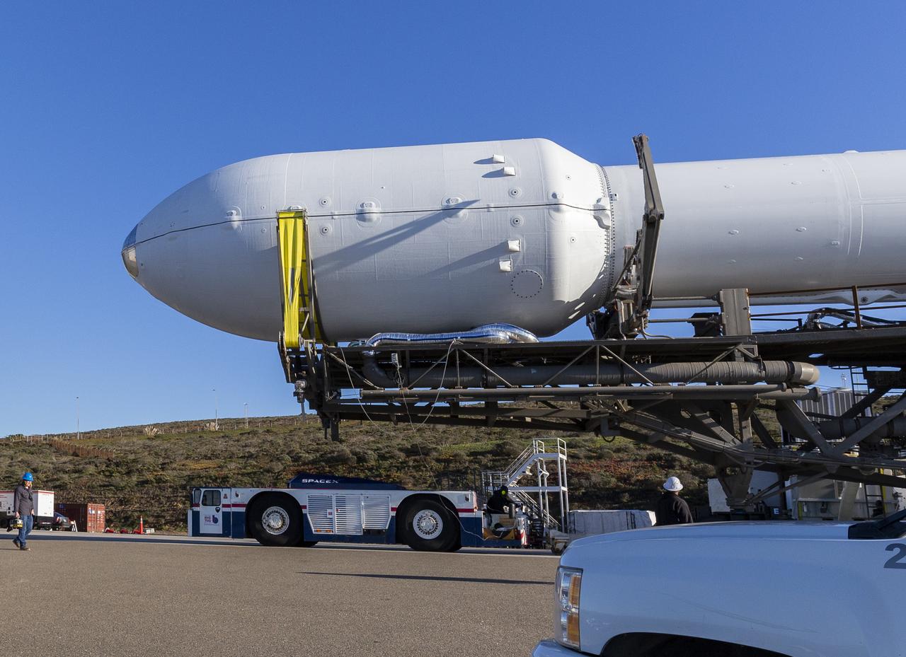 A SpaceX Falcon 9 rocket with the Surface Water and Ocean Topography (SWOT) spacecraft onboard is seen as it rolls out to the pad, Tuesday, Dec. 13, 2022, at Space Launch Complex 4E at Vandenberg Space Force Base in California. Jointly developed by NASA and Centre National D'Etudes Spatiales (CNES), with contributions from the Canadian Space Agency (CSA) and United Kingdom Space Agency, SWOT is the first satellite mission that will observe nearly all water on Earth’s surface, measuring the height of water in the planet’s lakes, rivers, reservoirs, and the ocean. Photo Credit: (NASA/Keegan Barber)