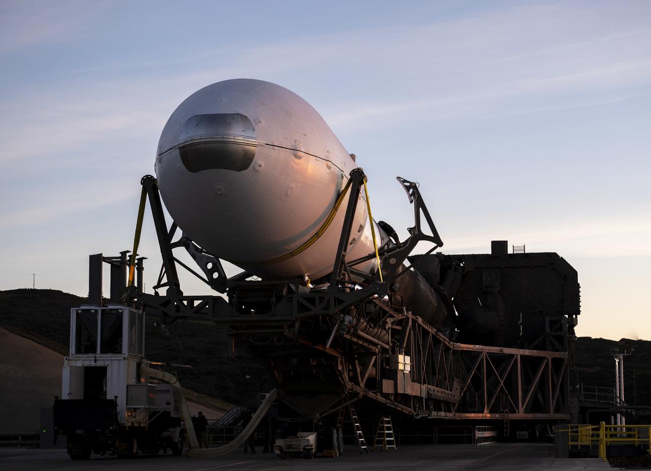 A SpaceX Falcon 9 rocket with the Surface Water and Ocean Topography (SWOT) spacecraft onboard is seen as it rolls out to the pad, Tuesday, Dec. 13, 2022, at Space Launch Complex 4E at Vandenberg Space Force Base in California. Jointly developed by NASA and Centre National D'Etudes Spatiales (CNES), with contributions from the Canadian Space Agency (CSA) and United Kingdom Space Agency, SWOT is the first satellite mission that will observe nearly all water on Earth’s surface, measuring the height of water in the planet’s lakes, rivers, reservoirs, and the ocean. Photo Credit: (NASA/Keegan Barber)
