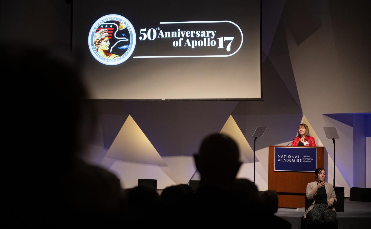 Colleen Hartman, director of physics, aeronautics, and space science at the National Academies of Science gives closing remarks during an event celebrating the 50th anniversary of the Apollo 17 mission, Wednesday, Dec. 14, 2022, at the National Academies of Science in Washington. The three-astronaut crew of Apollo 17 -  commander Eugene Cernan, lunar module pilot Harrison Schmitt, and command module pilot Ronald Evans, embarked on the last mission of the Apollo program to land humans on the Moon in December of 1972. Cernan and Schmitt spent three days on the lunar surface collecting samples and performing scientific experiments before lifting off from the Taurus-Littrow Valley on December 14, 1972.  Photo Credit: (NASA/Joel Kowsky)