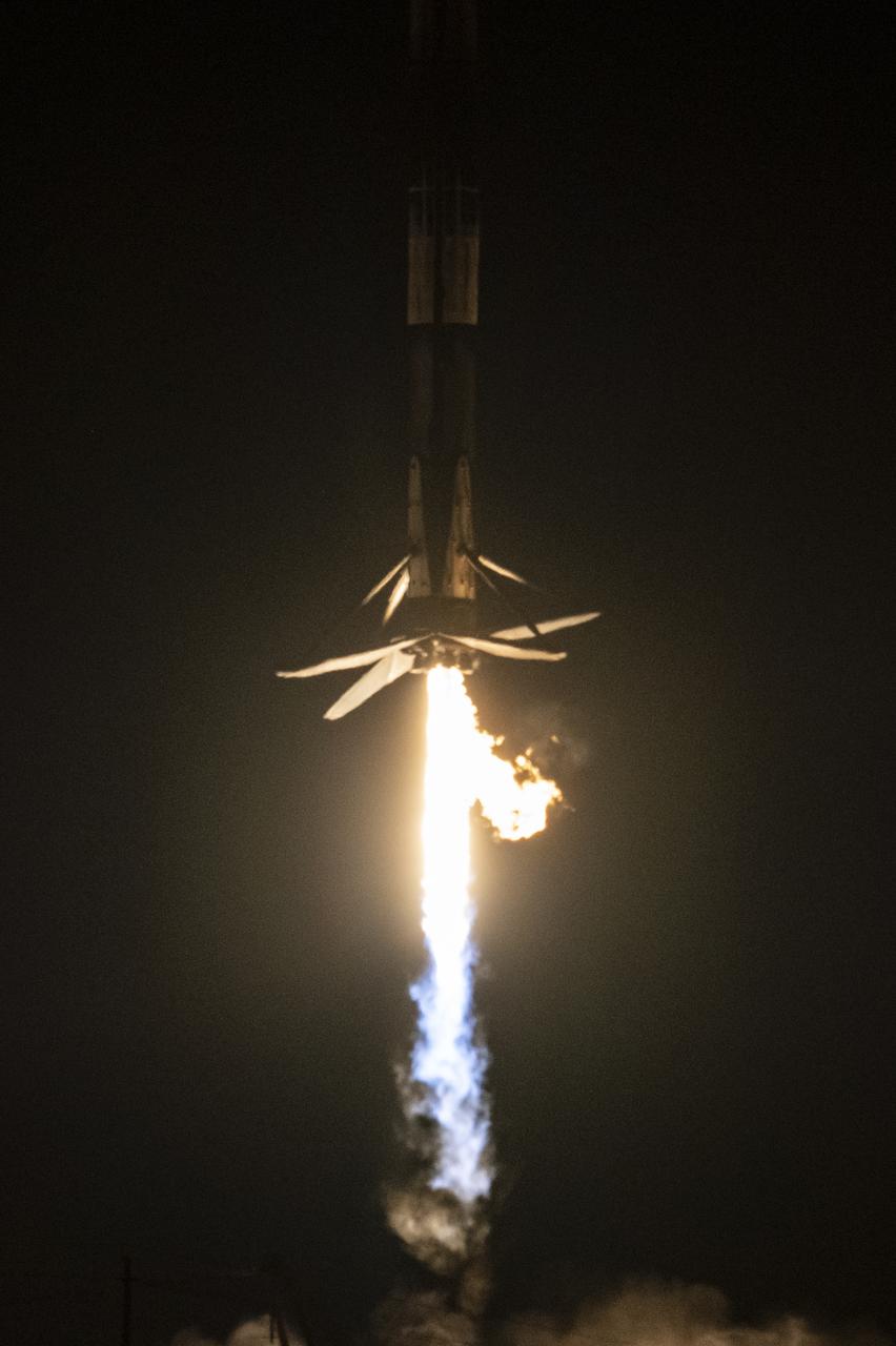 A SpaceX Falcon 9 first-stage booster returns to the landing pad following the launch of the Surface Water and Ocean Topography (SWOT) spacecraft, Friday, Dec. 16, 2022, from Space Launch Complex 4E at Vandenberg Space Force Base in California. Jointly developed by NASA and Centre National D'Etudes Spatiales (CNES), with contributions from the Canadian Space Agency (CSA) and United Kingdom Space Agency, SWOT is the first satellite mission that will observe nearly all water on Earth’s surface, measuring the height of water in the planet’s lakes, rivers, reservoirs, and the ocean. Photo Credit: (NASA/Keegan Barber)