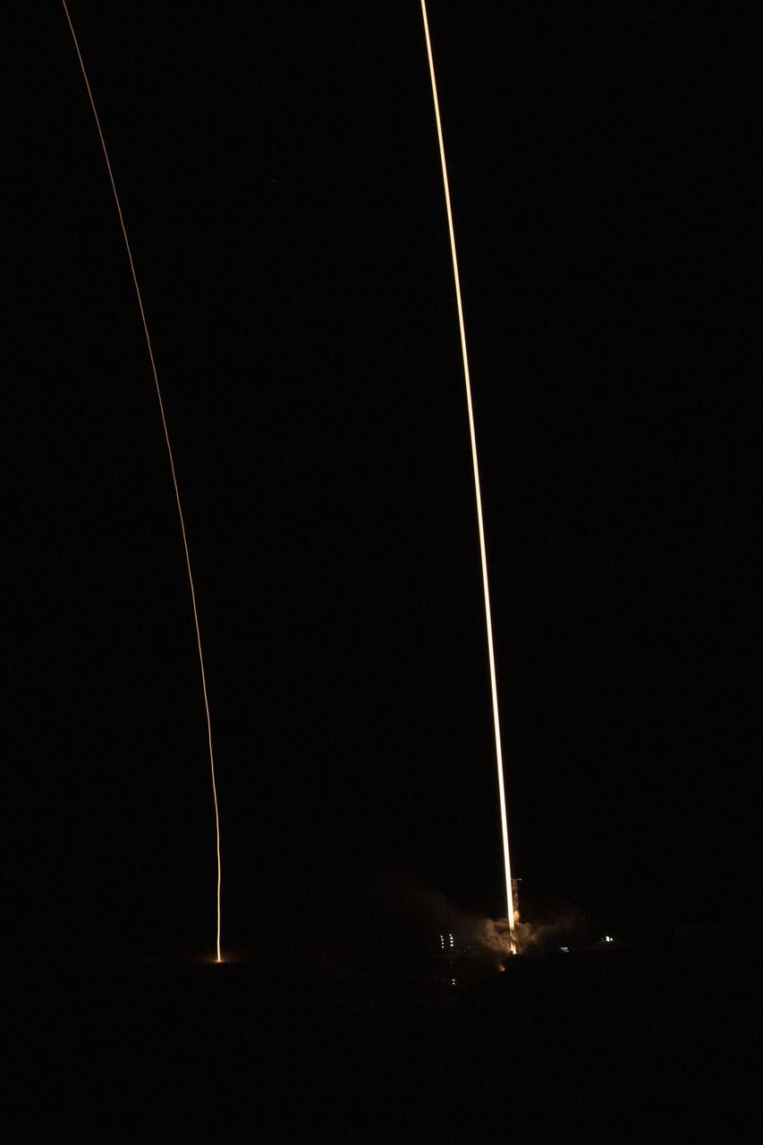 In this 8 minute exposure, A SpaceX Falcon 9 rocket launches with the Surface Water and Ocean Topography (SWOT) spacecraft onboard, right, Friday, Dec. 16, 2022, from Space Launch Complex 4E at Vandenberg Space Force Base in California. The SpaceX Falcon 9 first-stage booster is also seen, left, as it returns to the landing pad following the launch. Jointly developed by NASA and Centre National D'Etudes Spatiales (CNES), with contributions from the Canadian Space Agency (CSA) and United Kingdom Space Agency, SWOT is the first satellite mission that will observe nearly all water on Earth’s surface, measuring the height of water in the planet’s lakes, rivers, reservoirs, and the ocean. Photo Credit: (NASA/Keegan Barber)