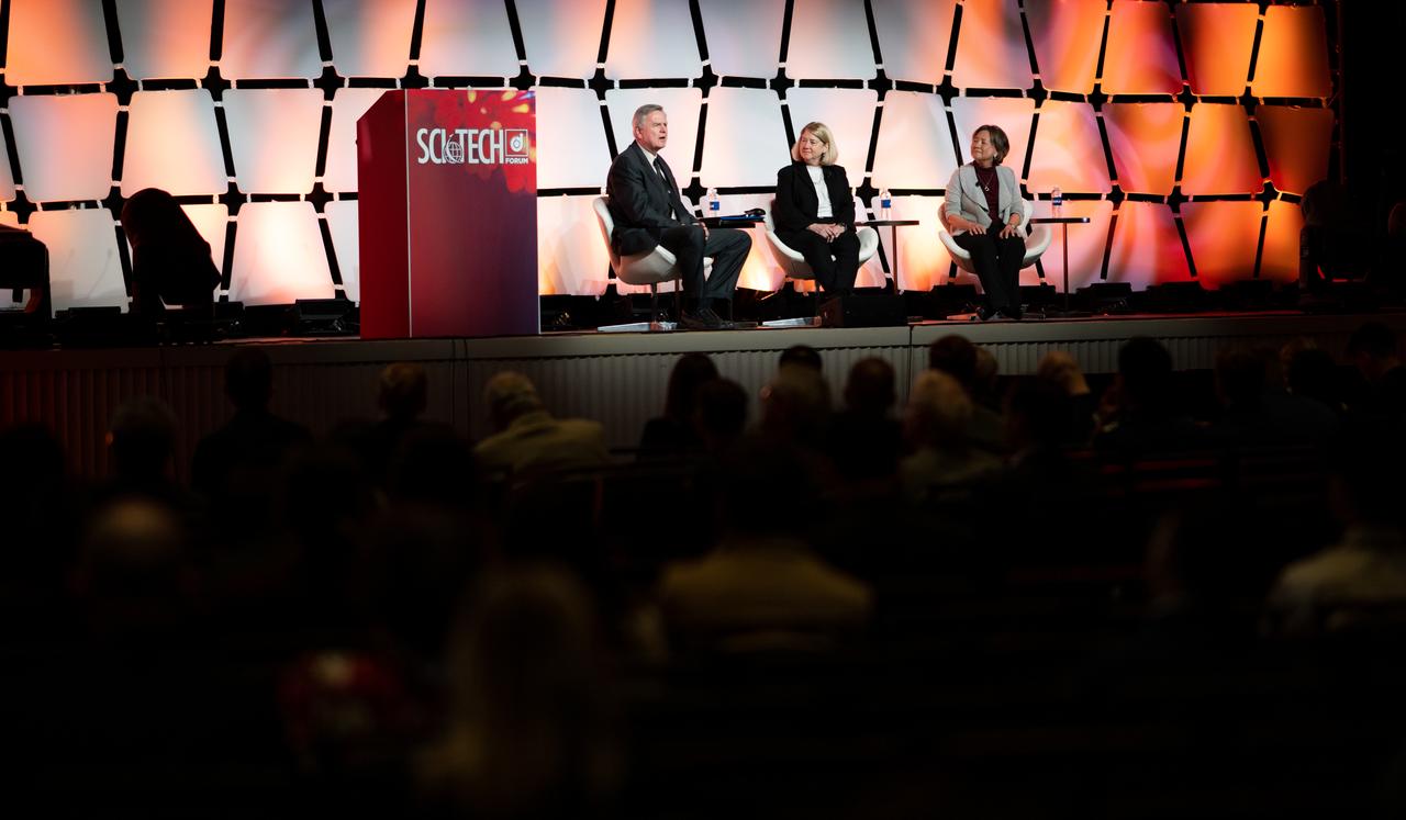 Steve Howe, former director of the Center for Space Nuclear Research at the Idaho National Laboratory, left, NASA Deputy Administrator Pam Melroy, center, and Stefanie Tompkins, director of the Defense Advance Research Projects Agency (DARPA), right, are seen during a fireside chat announcing a new collaboration on nuclear thermal propulsion at the American Institute of Aeronautics and Astronautics SciTech Forum, Tuesday, Jan. 24, 2023, at the Gaylord National Resort and Convention Center in National Harbor, Md. NASA and the Defense Advanced Research Projects Agency (DARPA) will partner on the Demonstration Rocket for Agile Cislunar Operations, or DRACO, project to develop and demonstrate in-space a nuclear thermal engine. Photo Credit: (NASA/Joel Kowsky)
