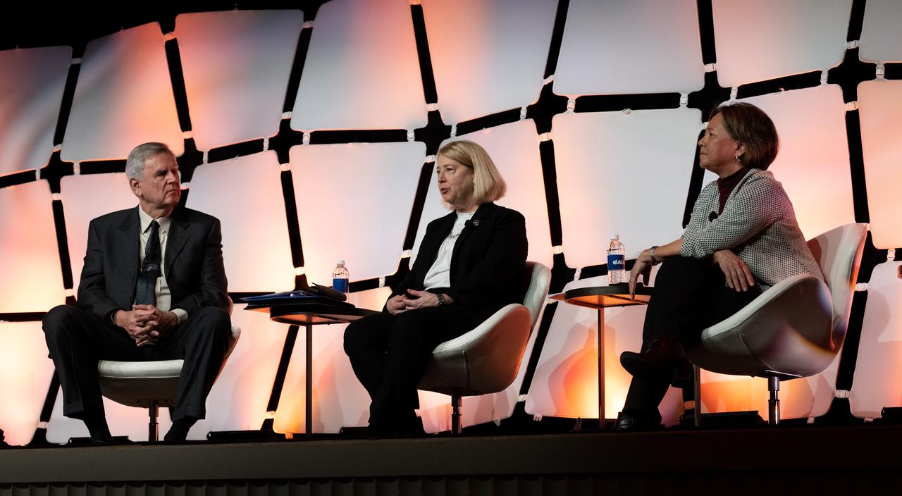 Steve Howe, former director of the Center for Space Nuclear Research at the Idaho National Laboratory, left, NASA Deputy Administrator Pam Melroy, center, and Stefanie Tompkins, director of the Defense Advance Research Projects Agency (DARPA), right, are seen during a fireside chat announcing a new collaboration on nuclear thermal propulsion at the American Institute of Aeronautics and Astronautics SciTech Forum, Tuesday, Jan. 24, 2023, at the Gaylord National Resort and Convention Center in National Harbor, Md. NASA and the Defense Advanced Research Projects Agency (DARPA) will partner on the Demonstration Rocket for Agile Cislunar Operations, or DRACO, project to develop and demonstrate in-space a nuclear thermal engine. Photo Credit: (NASA/Joel Kowsky)