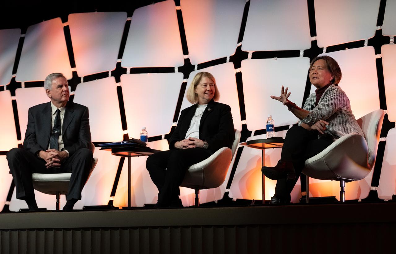 Stefanie Tompkins, director of the Defense Advance Research Projects Agency (DARPA), right, answers a question alongside Steve Howe, former director of the Center for Space Nuclear Research at the Idaho National Laboratory, left, NASA Deputy Administrator Pam Melroy, center, during a fireside chat announcing a new collaboration on nuclear thermal propulsion at the American Institute of Aeronautics and Astronautics SciTech Forum, Tuesday, Jan. 24, 2023, at the Gaylord National Resort and Convention Center in National Harbor, Md. NASA and the Defense Advanced Research Projects Agency (DARPA) will partner on the Demonstration Rocket for Agile Cislunar Operations, or DRACO, project to develop and demonstrate in-space a nuclear thermal engine. Photo Credit: (NASA/Joel Kowsky)