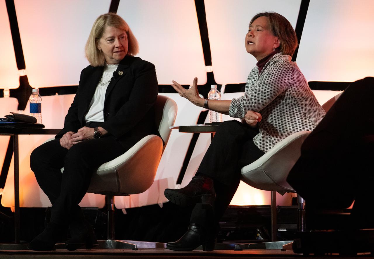 NASA Deputy Administrator Pam Melroy, left, and Stefanie Tompkins, director of the Defense Advance Research Projects Agency (DARPA), right, are seen during a fireside chat announcing a new collaboration on nuclear thermal propulsion at the American Institute of Aeronautics and Astronautics SciTech Forum, Tuesday, Jan. 24, 2023, at the Gaylord National Resort and Convention Center in National Harbor, Md. NASA and the Defense Advanced Research Projects Agency (DARPA) will partner on the Demonstration Rocket for Agile Cislunar Operations, or DRACO, project to develop and demonstrate in-space a nuclear thermal engine. Photo Credit: (NASA/Joel Kowsky)