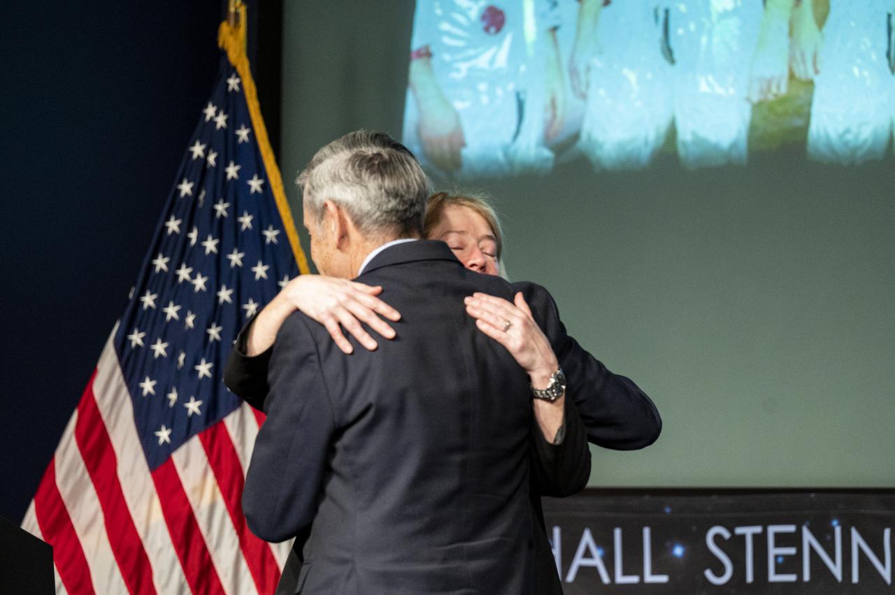 NASA Deputy Administrator Pam Melroy hugs NASA Associate Administrator Bob Cabana during the NASA Day of Remembrance Employee Safety Town Hall, Tuesday, Jan. 24, 2023, at the Mary W. Jackson NASA Headquarters building in Washington.  Photo Credit: (NASA/Keegan Barber)