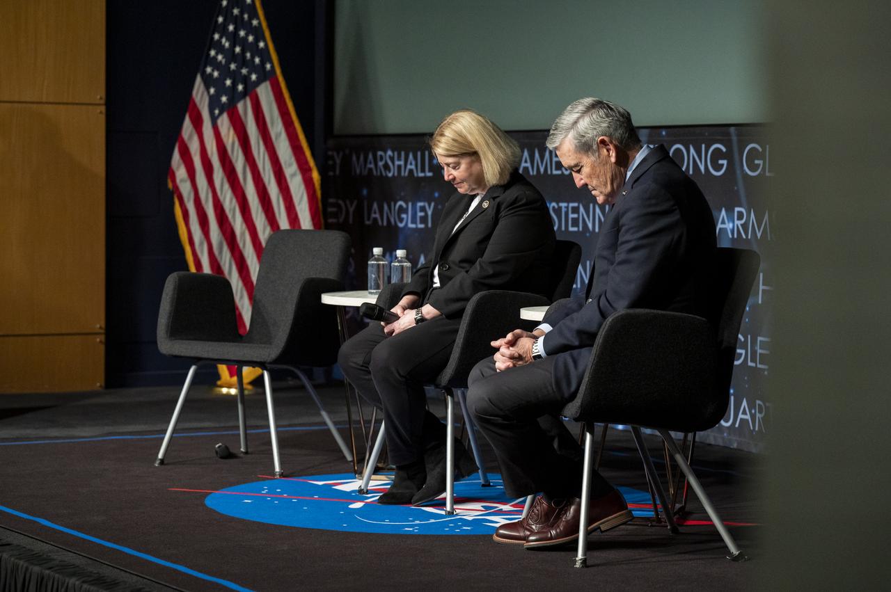 NASA Deputy Administrator Pam Melroy, left, and NASA Associate Administrator Bob Cabana, right, participate in a moment of silence during the NASA Day of Remembrance Employee Safety Town Hall, Tuesday, Jan. 24, 2023, at the Mary W. Jackson NASA Headquarters building in Washington.  Photo Credit: (NASA/Keegan Barber)