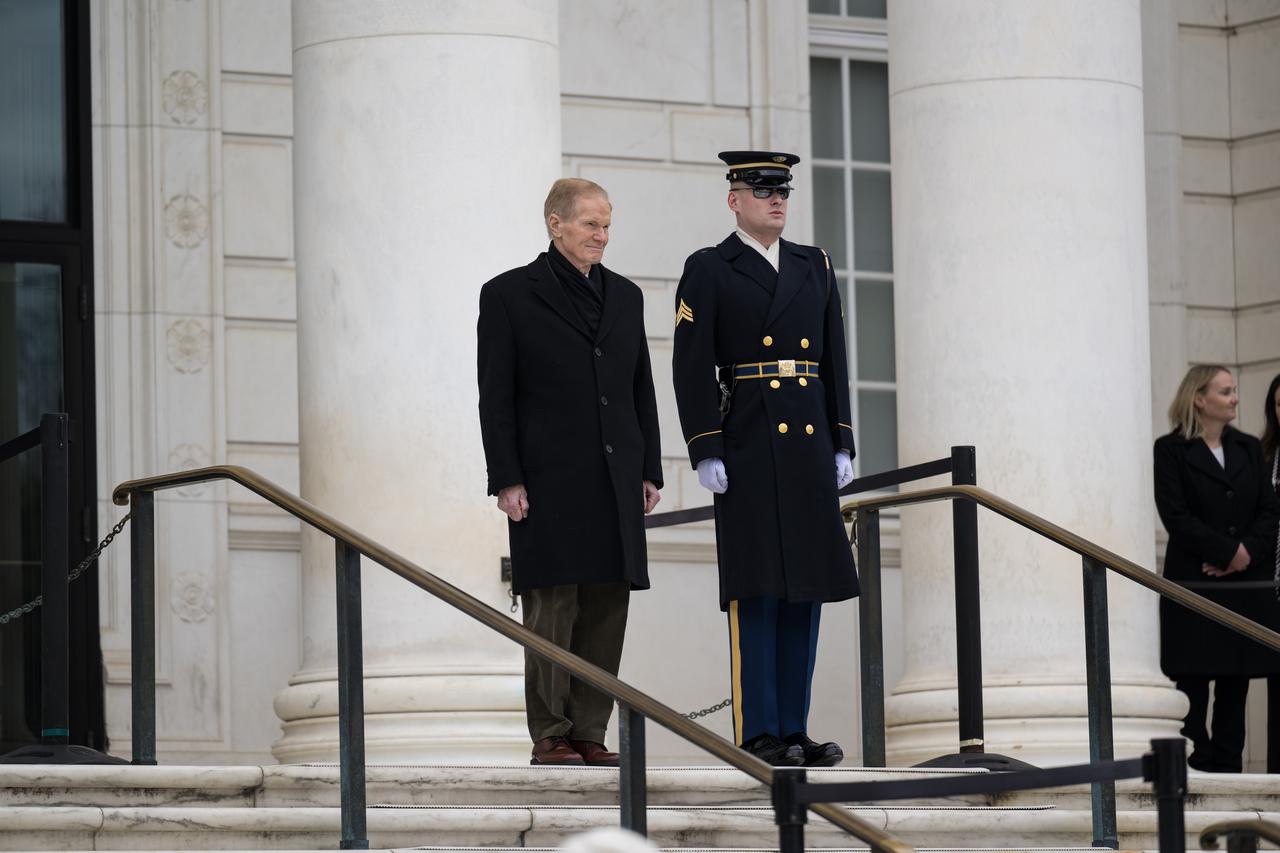 NASA Administrator Bill Nelson prepares to be escorted to the Tomb of the Unknowns for a wreath laying ceremony, as part of NASA's Day of Remembrance, Thursday, Jan. 26, 2023, at Arlington National Cemetery in Arlington, Va.  The wreaths were laid in memory of those men and women who lost their lives in the quest for space exploration.  Photo Credit: (NASA/Aubrey Gemignani)