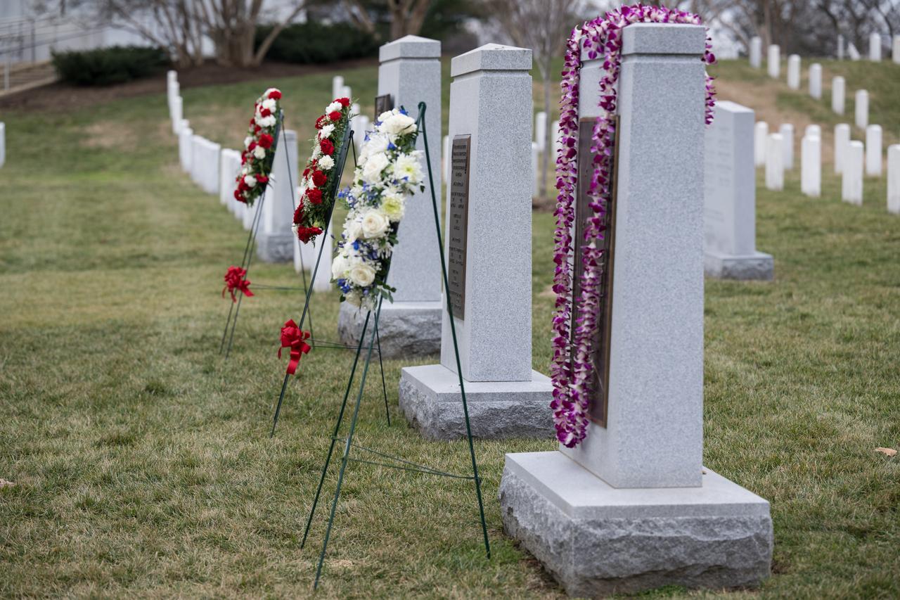 The Space Shuttle Columbia and Space Shuttle Challenger Memorials are seen after a wreath laying ceremony that was part of NASA's Day of Remembrance, Thursday, Jan. 26, 2023, at Arlington National Cemetery in Arlington, Va. Wreaths were laid in memory of those men and women who lost their lives in the quest for space exploration.  Photo Credit: (NASA/Aubrey Gemignani)