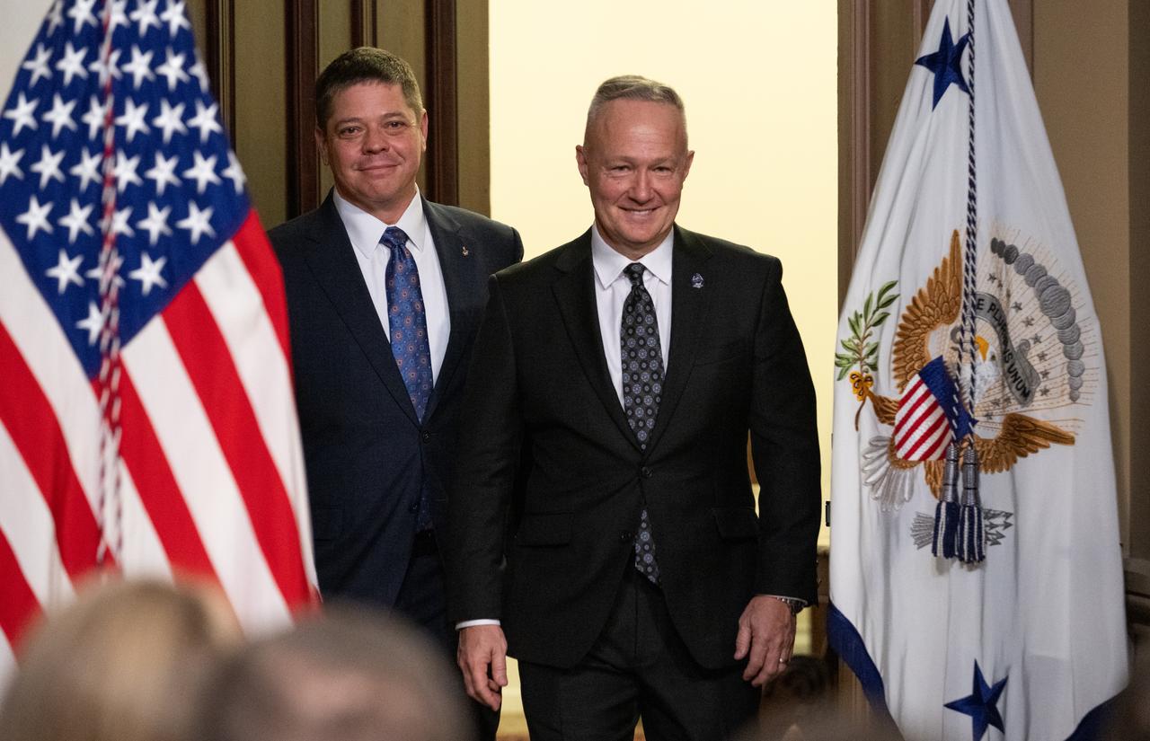 Former NASA astronauts Robert Behnken and Douglas Hurley are seen as they arrive prior to being awarded the Congressional Space Medal of Honor by Vice President Kamala Harris during a ceremony in the Indian Treaty Room of the Eisenhower Executive Office Building, Tuesday, Jan. 31, 2023, in Washington. Former astronauts Behnken and Hurley were awarded the Congressional Space Medal of Honor for their bravery in NASA’s SpaceX Demonstration Mission-2 to the International Space Station in 2020, the first crewed flight as part of the agency’s Commercial Crew Program. Photo Credit: (NASA/Joel Kowsky)