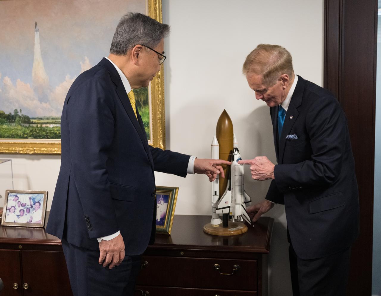 NASA Administrator Bill Nelson shows Republic of Korea Minister of Foreign Affairs, Jin Park, where he sat on the Space Shuttle Columbia during his mission STS-61-C, Thursday, Feb. 2, 2023 at the Mary W. Jackson NASA Headquarters building in Washington DC. Photo Credit: (NASA/Aubrey Gemignani)
