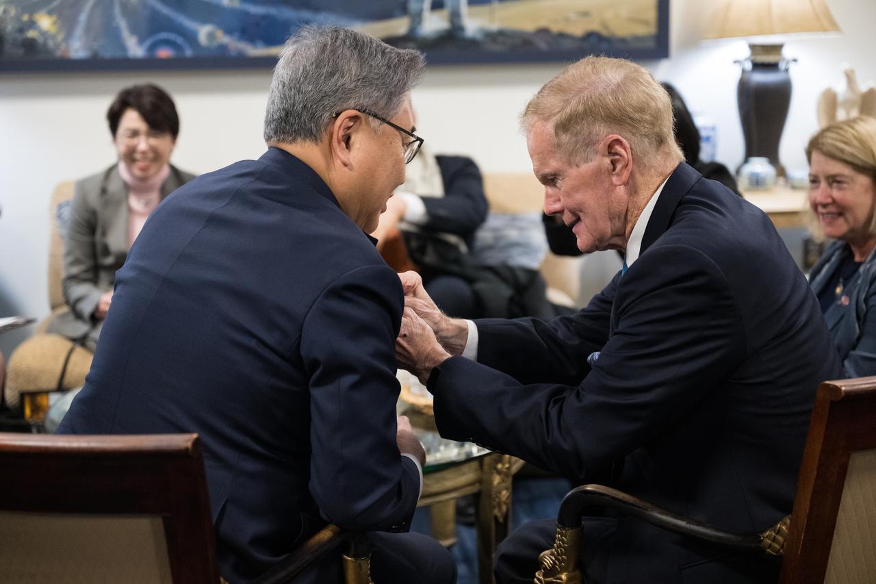 NASA Administrator Bill Nelson presents a NASA pin to the Republic of Korea Minister of Foreign Affairs, Jin Park, Thursday, Feb. 2, 2023 at the Mary W. Jackson NASA Headquarters building in Washington DC. Photo Credit: (NASA/Aubrey Gemignani)
