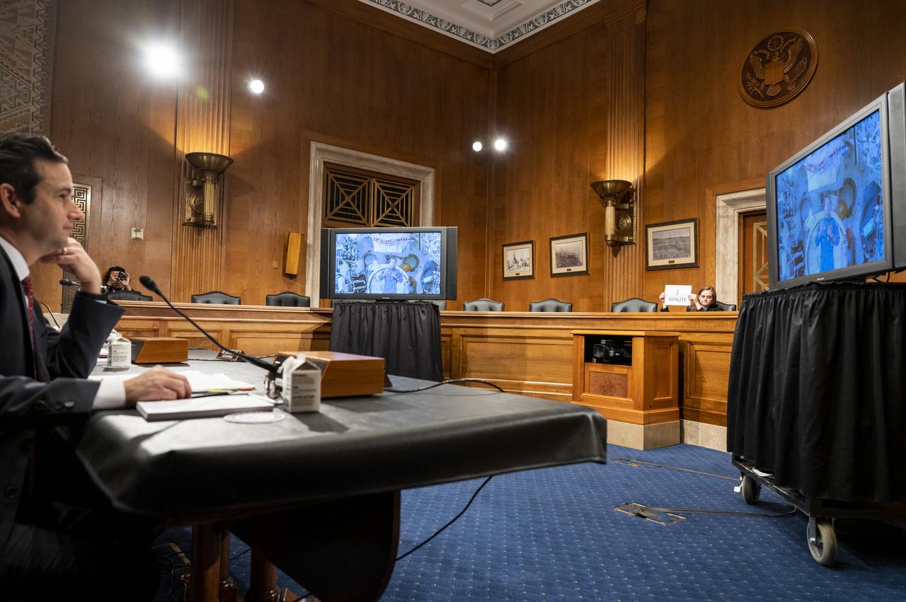 NASA astronaut Nicole Mann, Expedition 68 Flight Engineer, is seen from onboard the International Space Station (ISS) during a briefing with members of the House of Representatives, the Indian Affairs Committee, and the Senate Native American Affairs Committee, Tuesday, Feb. 7, 2023, at the Dirksen Senate Office Building in Washington.  Mann answered questions from members of the committees during a live downlink from the International Space Station. Photo Credit: (NASA/Keegan Barber)