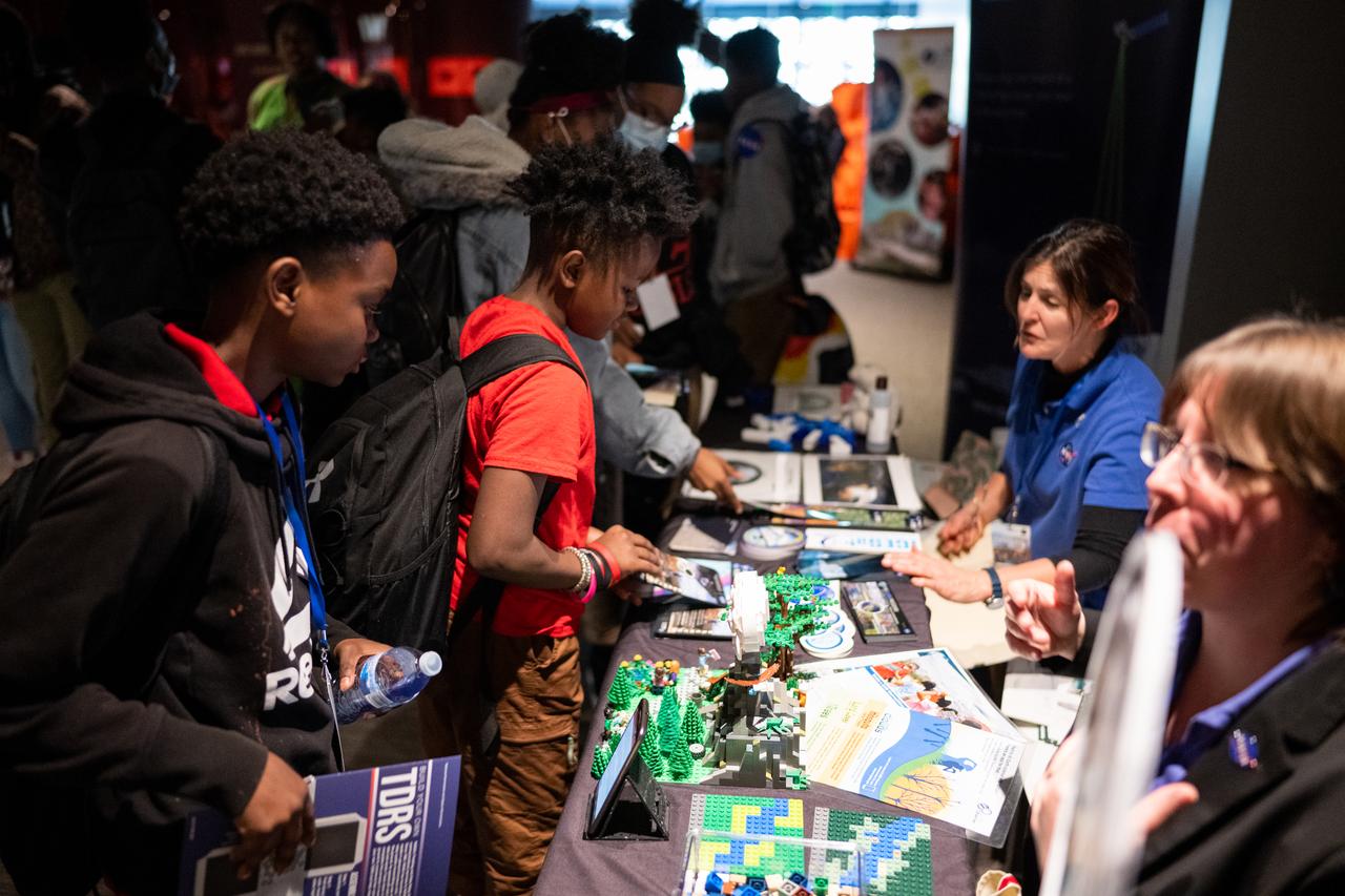 Students from local schools view STEM exhibits during an event celebrating Black History Month at the Smithsonian National Museum of African American History and Culture, Friday, Feb. 10, 2023, in Washington. Photo Credit: (NASA/Joel Kowsky)