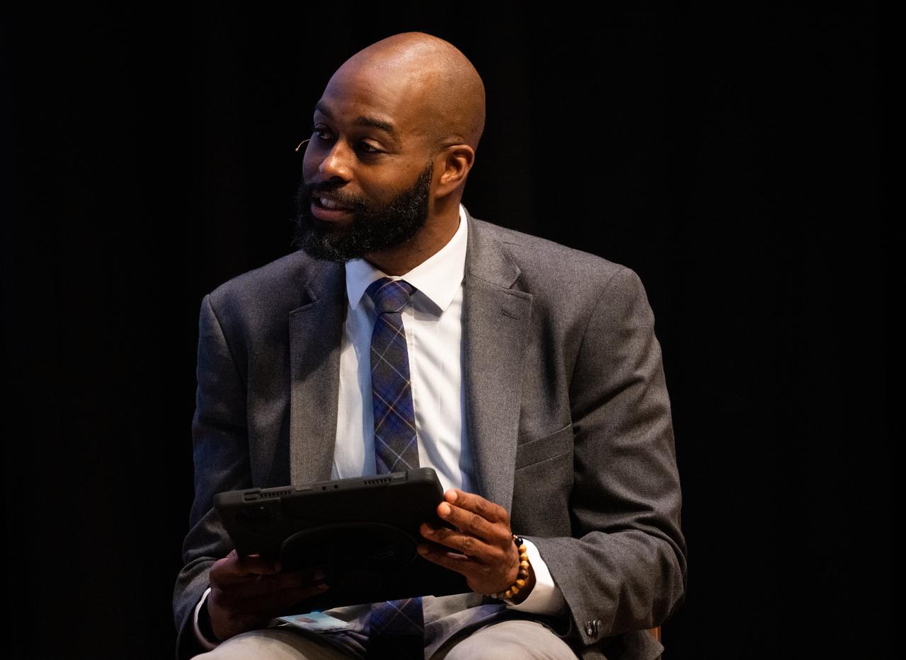 Christopher Williams, STEM Education Specialist at the Smithsonian National Museum of African American History and Culture, asks a question during a panel discussion titled A Space for Us All at an event celebrating Black History Month at the Smithsonian National Museum of African American History and Culture, Friday, Feb. 10, 2023, in Washington. Photo Credit: (NASA/Joel Kowsky)