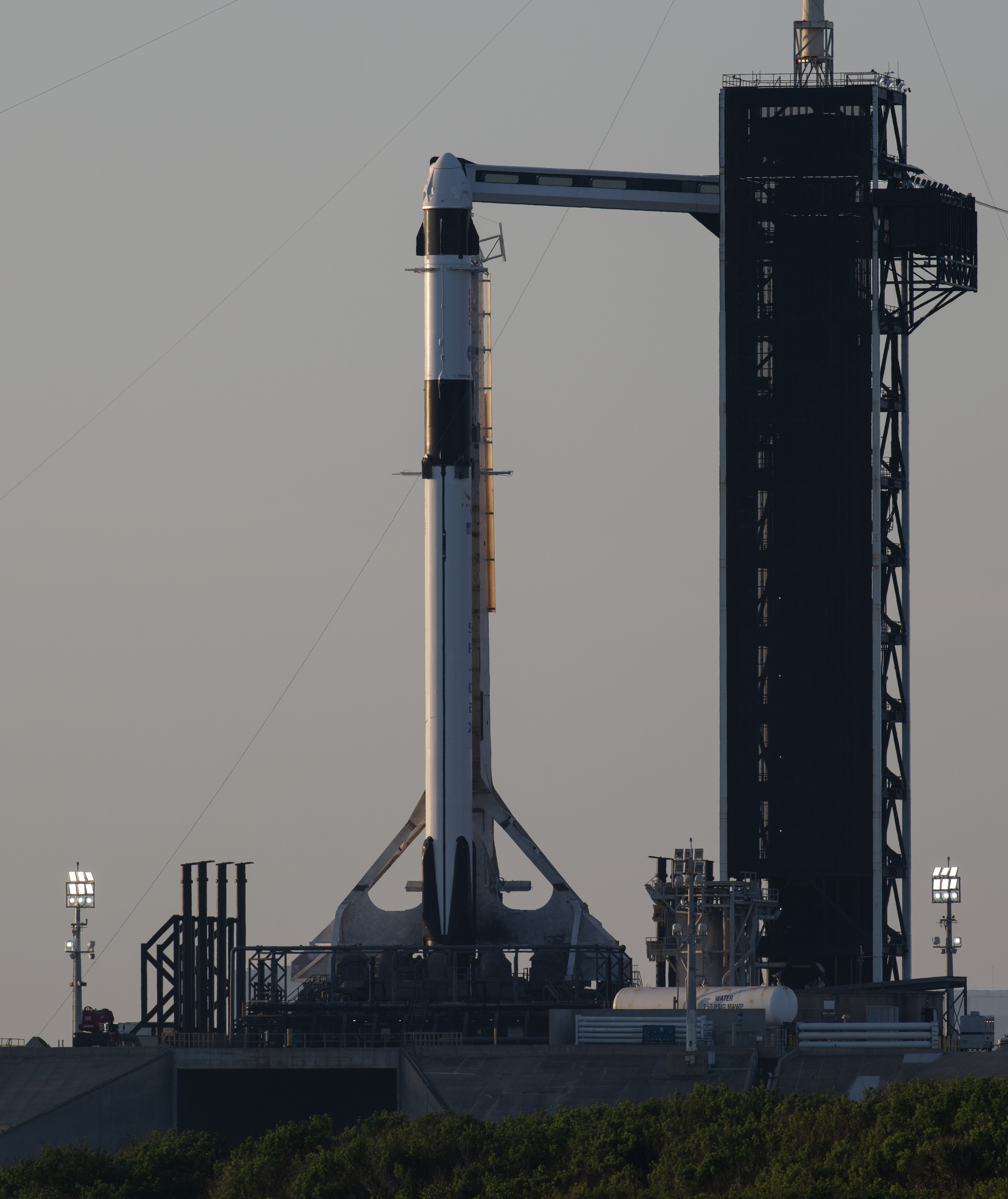 A SpaceX Falcon 9 rocket with the company's Dragon spacecraft on top is seen at sunrise on the launch pad at Launch Complex 39A as preparations continue for the Crew-6 mission, Thursday, Feb. 23, 2023, at NASA’s Kennedy Space Center in Florida. NASA’s SpaceX Crew-6 mission is the sixth crew rotation mission of the SpaceX Crew Dragon spacecraft and Falcon 9 rocket to the International Space Station as part of the agency’s Commercial Crew Program. NASA astronauts Stephen Bowen and Warren "Woody" Hoburg, UAE (United Arab Emirates) astronaut Sultan Alneyadi, and Roscosmos cosmonaut Andrey Fedyaev are scheduled to launch at 1:45 a.m. EST on Feb. 27, from Launch Complex 39A at the Kennedy Space Center. Photo Credit: (NASA/Joel Kowsky)