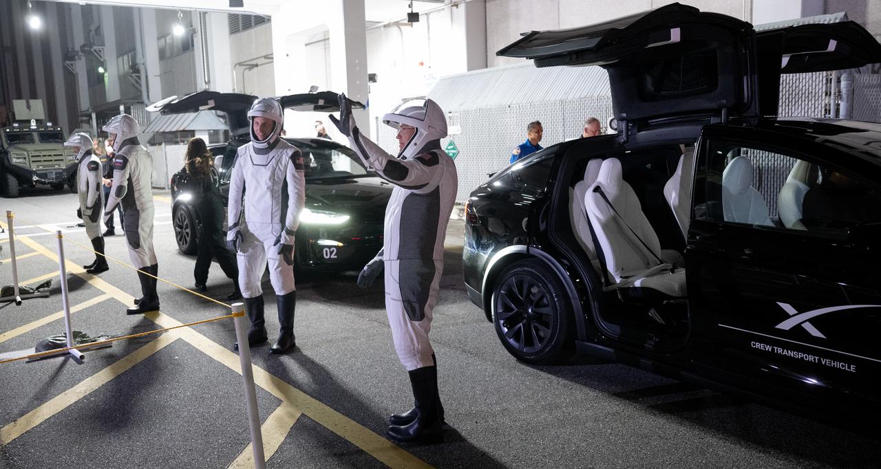 NASA astronauts Stephen Bowen, right, and Warren "Woody" Hoburg, second from right, Roscosmos cosmonaut Andrey Fedyaev, second from left, and UAE (United Arab Emirates) astronaut Sultan Alneyadi, left, wearing SpaceX spacesuits, are seen as they prepare to depart the Neil  A. Armstrong Operations and Checkout Building for Launch Complex 39A during a dress rehearsal prior to the Crew-6 mission launch, Thursday, Feb. 23, 2023, at NASA’s Kennedy Space Center in Florida. NASA’s SpaceX Crew-6 mission is the sixth crew rotation mission of the SpaceX Dragon spacecraft and Falcon 9 rocket to the International Space Station as part of the agency’s Commercial Crew Program. Bowen, Hoburg, Alneyadi, and Fedyaev are scheduled to launch at 1:45 a.m. EST on Feb. 27, from Launch Complex 39A at the Kennedy Space Center. Photo Credit: (NASA/Joel Kowsky)