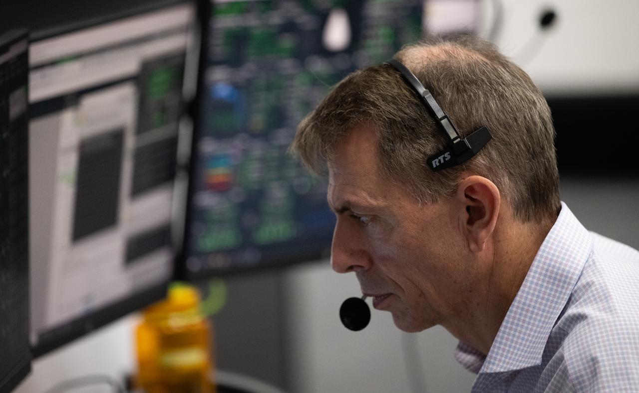 Zeb Scoville, NASA's deputy chief flight director, monitors the countdown during a dress rehearsal in preparation for the launch of a SpaceX Falcon 9 rocket carrying the company's Dragon spacecraft on NASA’s SpaceX Crew-6 mission with NASA astronauts Stephen Bowen and Warren "Woody" Hoburg, UAE (United Arab Emirates) astronaut Sultan Alneyadi, and Roscosmos cosmonaut Andrey Fedyaev onboard, Thursday, Feb. 23, 2023, in firing room four of the Rocco A. Petrone Launch Control Center at NASA’s Kennedy Space Center in Florida. NASA’s SpaceX Crew-6 mission is the sixth crew rotation mission of the SpaceX Dragon spacecraft and Falcon 9 rocket to the International Space Station as part of the agency’s Commercial Crew Program. Bowen, Hoburg, Alneyadi, and Fedyaev are scheduled to launch at 1:45 a.m. EST on Feb. 27, from Launch Complex 39A at the Kennedy Space Center. Photo Credit: (NASA/Joel Kowsky)